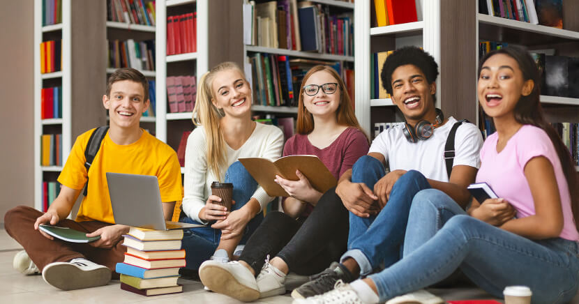 diverse-students-studying-in-library