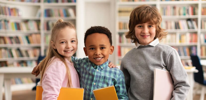 happy-kids-smiling-at-library