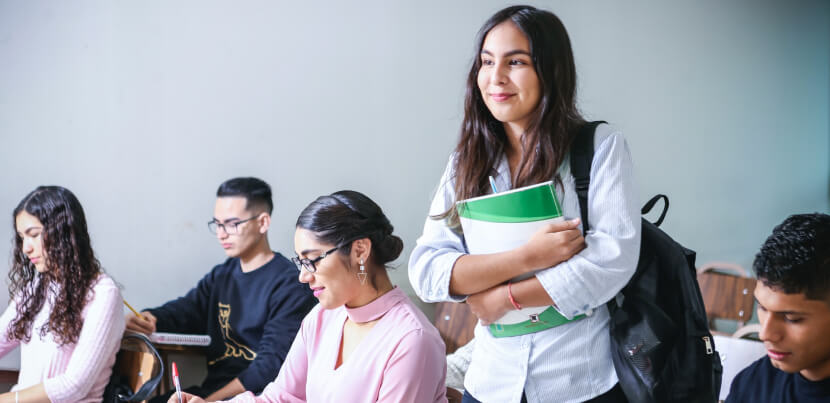 happy-student-walking-out-of-classroom