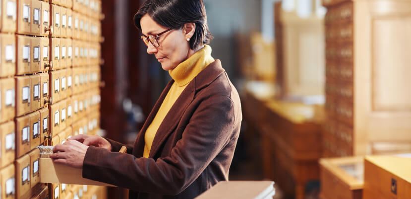 librarian-looking-through-catalogue