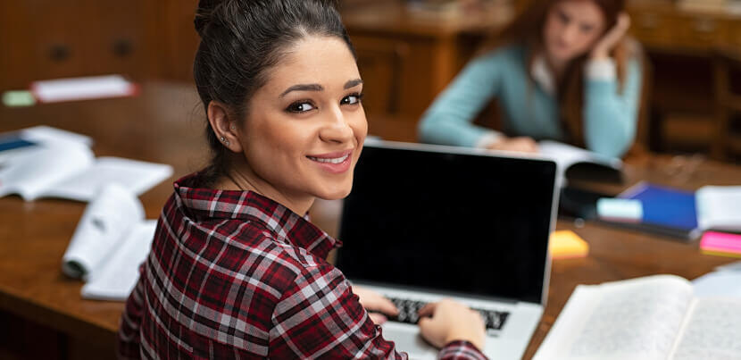 library-patron-working-on-laptop