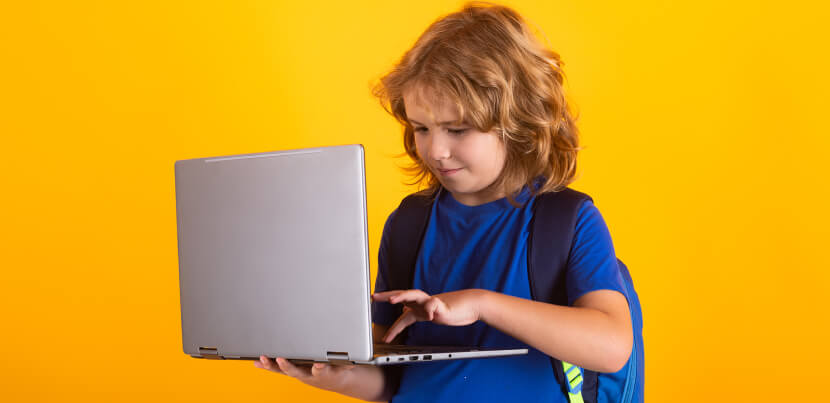 school-child-using-laptop-computer