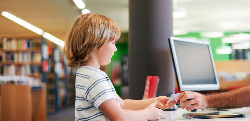 small-boy-at-library-desk