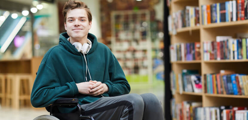 student-in-wheelchair-at-library